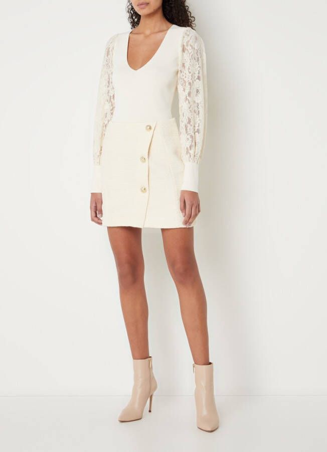 NIKKIE Nelly minirok met tweed look en sierknopen